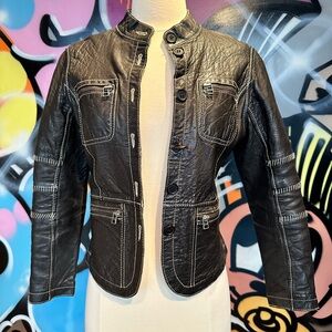 Distressed Leather jacket with pretty canvas lining size 2-4.